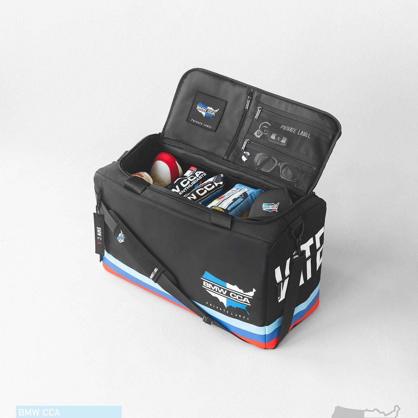 BMW CCA Black duffle with gear inside