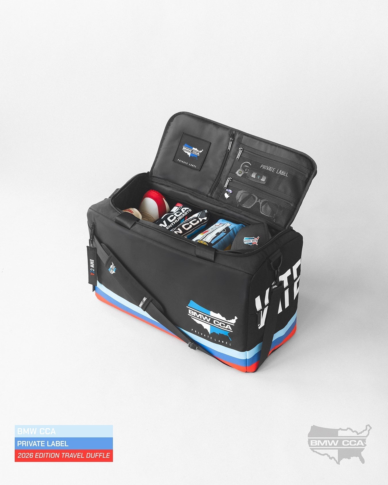BMW CCA Black duffle with gear inside