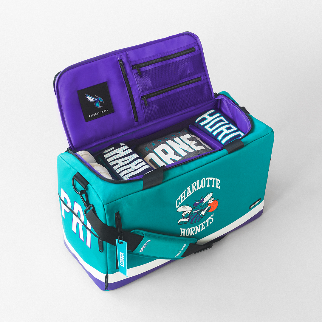 Teal duffle with a purple interior for the Hornets