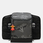 A black and gray patterned backpack shown from the front, with a matching black zippered pouch placed behind it on a light gray background. The front bag has a gray geometric diamond pattern on a black base, and the pouch behind it is solid black with side pockets and a small red-and-yellow hanging tag.