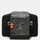 A black and gray patterned backpack shown from the front, with a matching black zippered pouch placed behind it on a light gray background. The front bag has a gray geometric diamond pattern on a black base, and the pouch behind it is solid black with side pockets and a small red-and-yellow hanging tag.