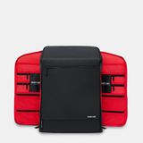 Black backpack with red interior opened on both sides