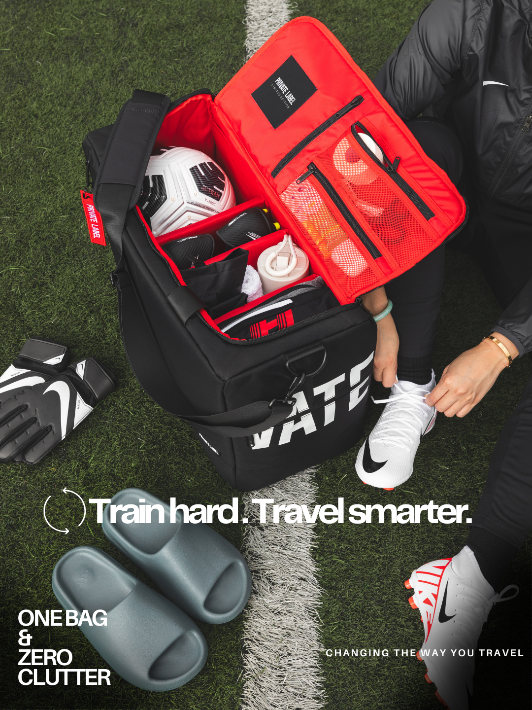 Sports bag with soccer gear on a grass field, featuring text 'Train hard. Travel smarter.'