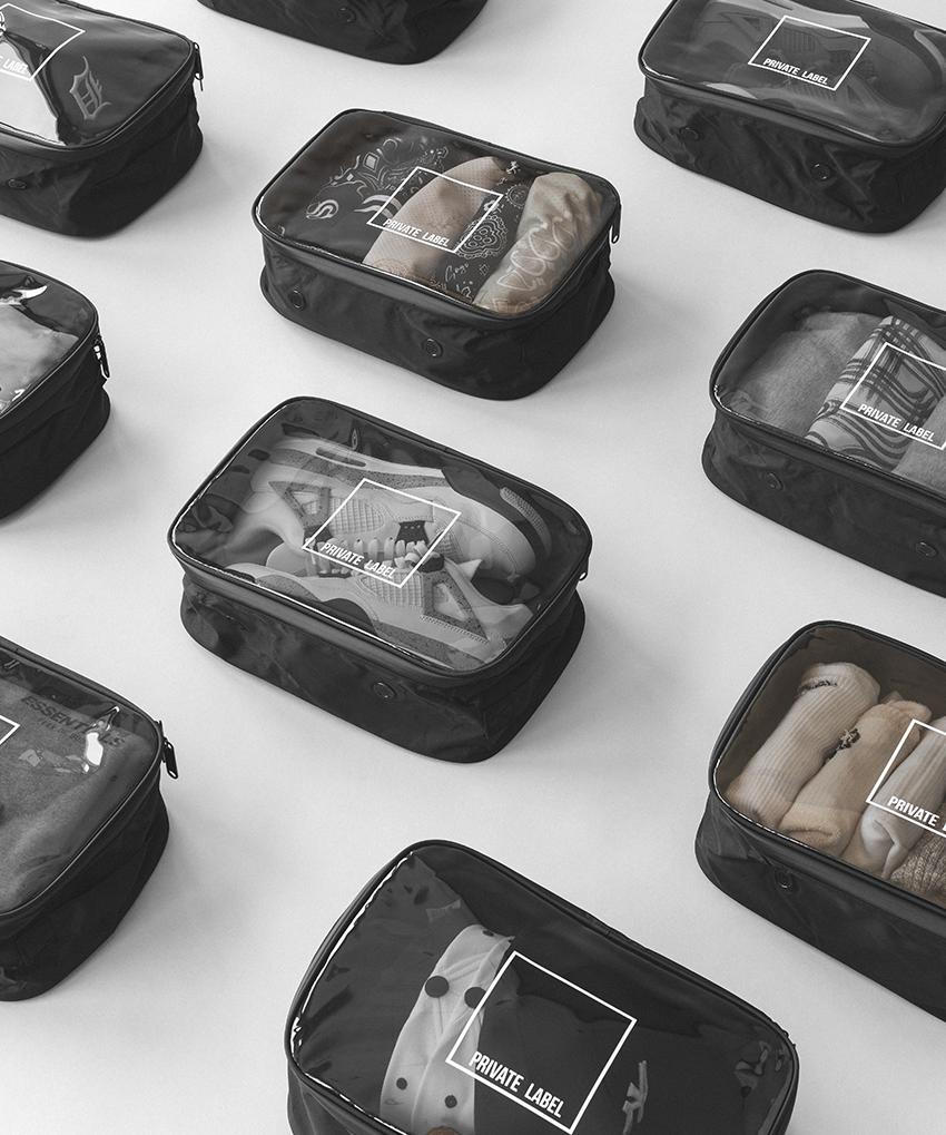 closed view of clear packing cubes with clothes, shoes and caps packed inside.
