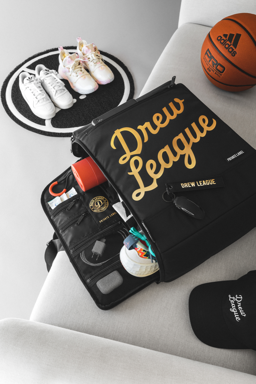 Drew league black backpack with shoe and basketball accessories surrounding it