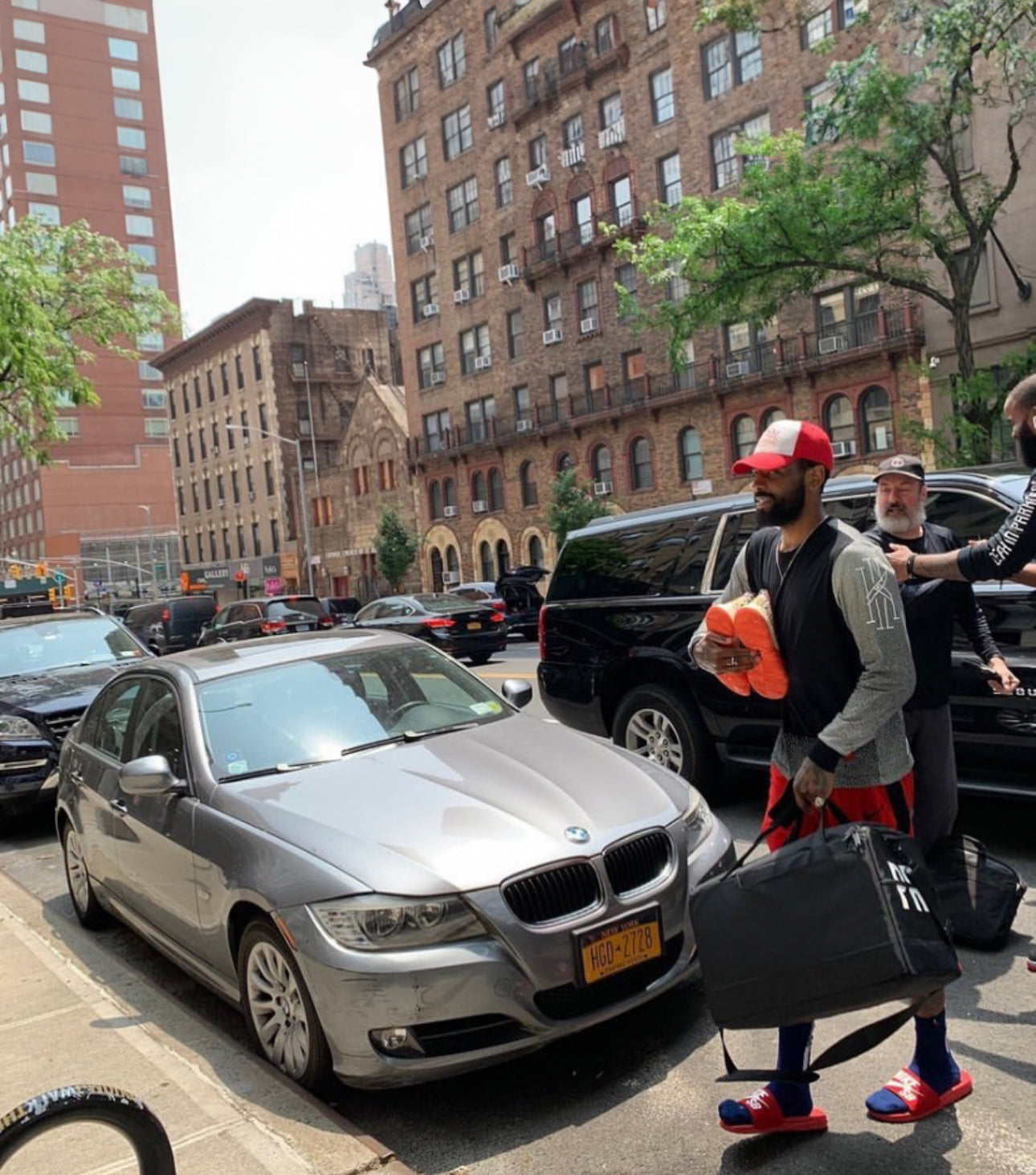 Kyrie Irving on the streets with a Private Label duffle