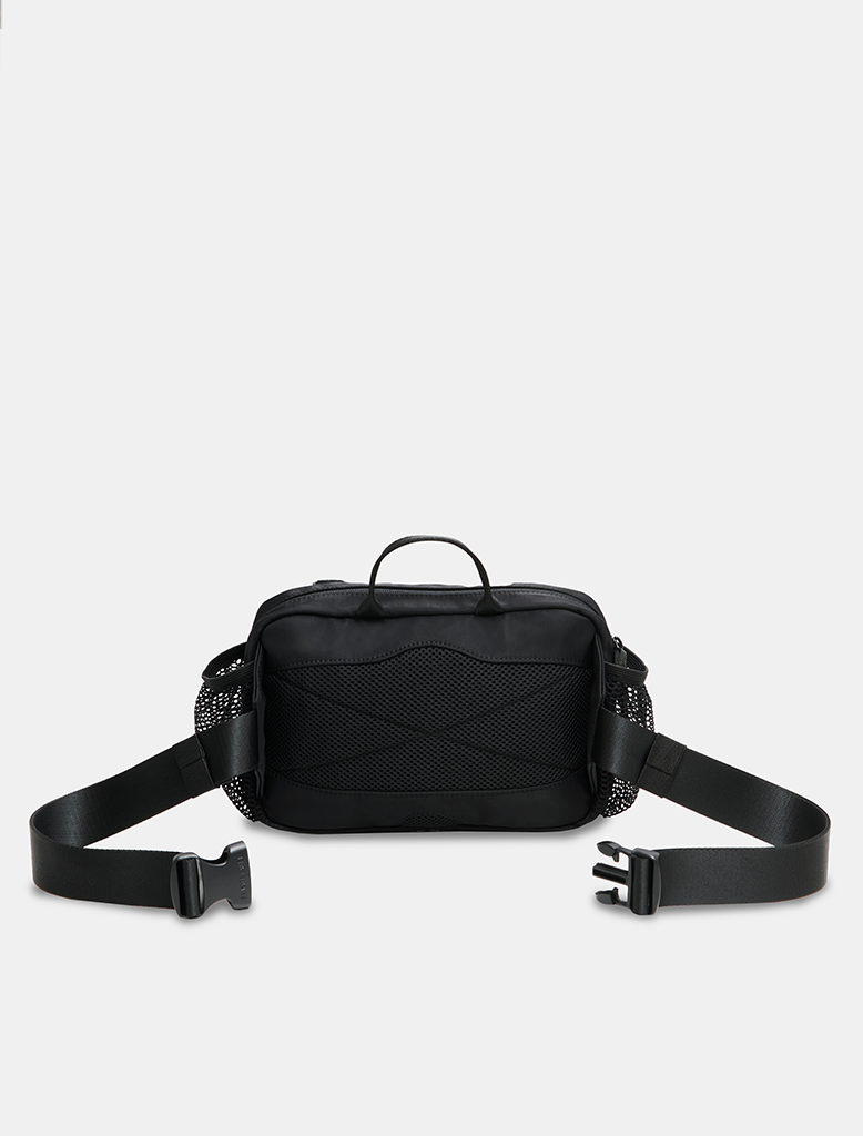 Black waist bag with a strap on a light gray background