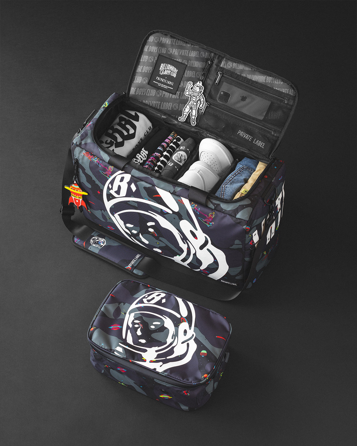 Billionaire boys club branded private label duffle bag with clothes & shoes packed inside