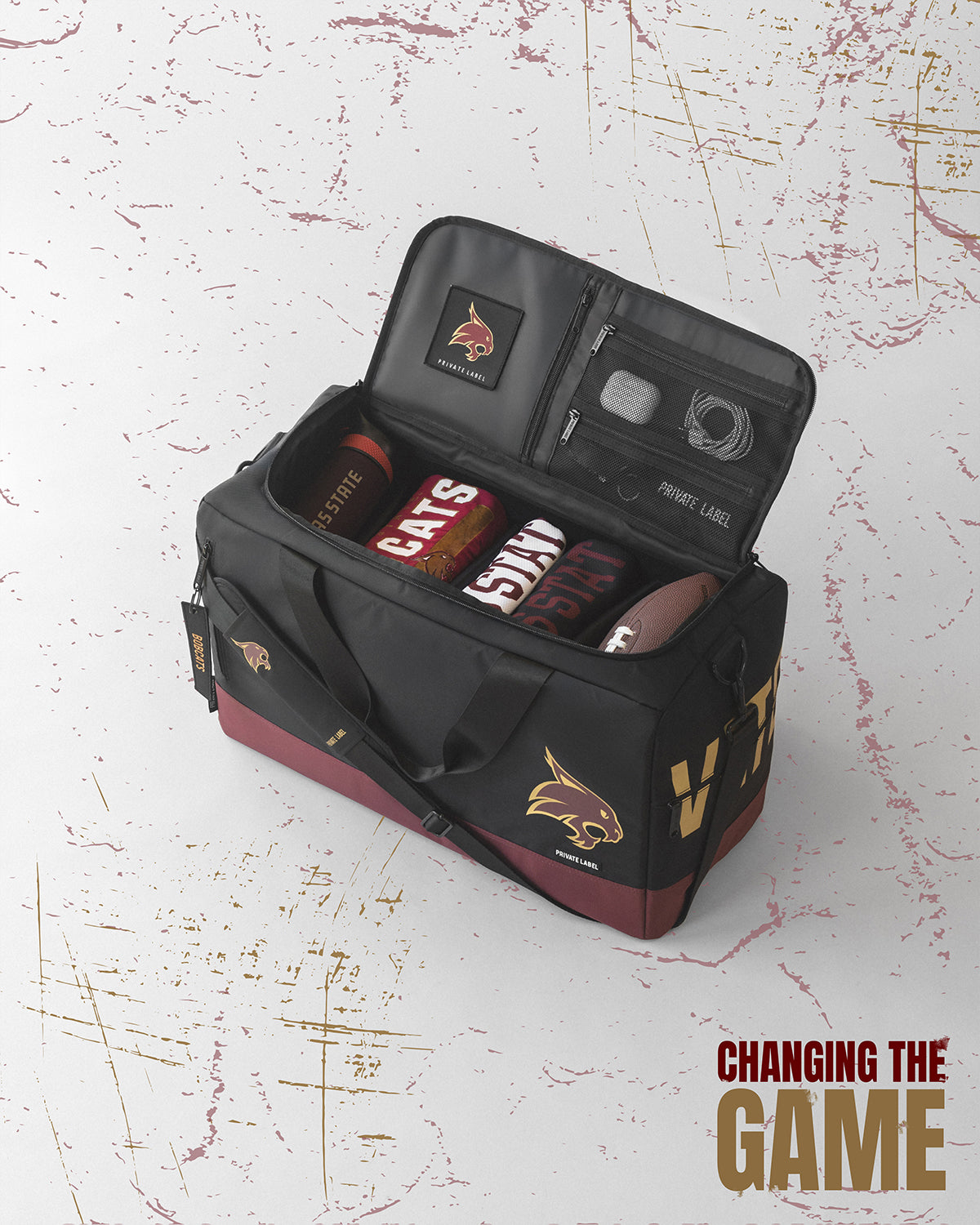 Texas State Bobcats Black duffle with team merchandise packed inside 